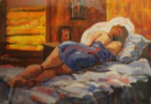 woman lying on bed with back to viewer iwith orange light through the window dreaming