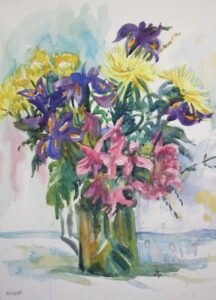 a colourful vase of flowers reflecting happiness