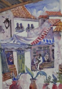 street scene in morocco with white houses